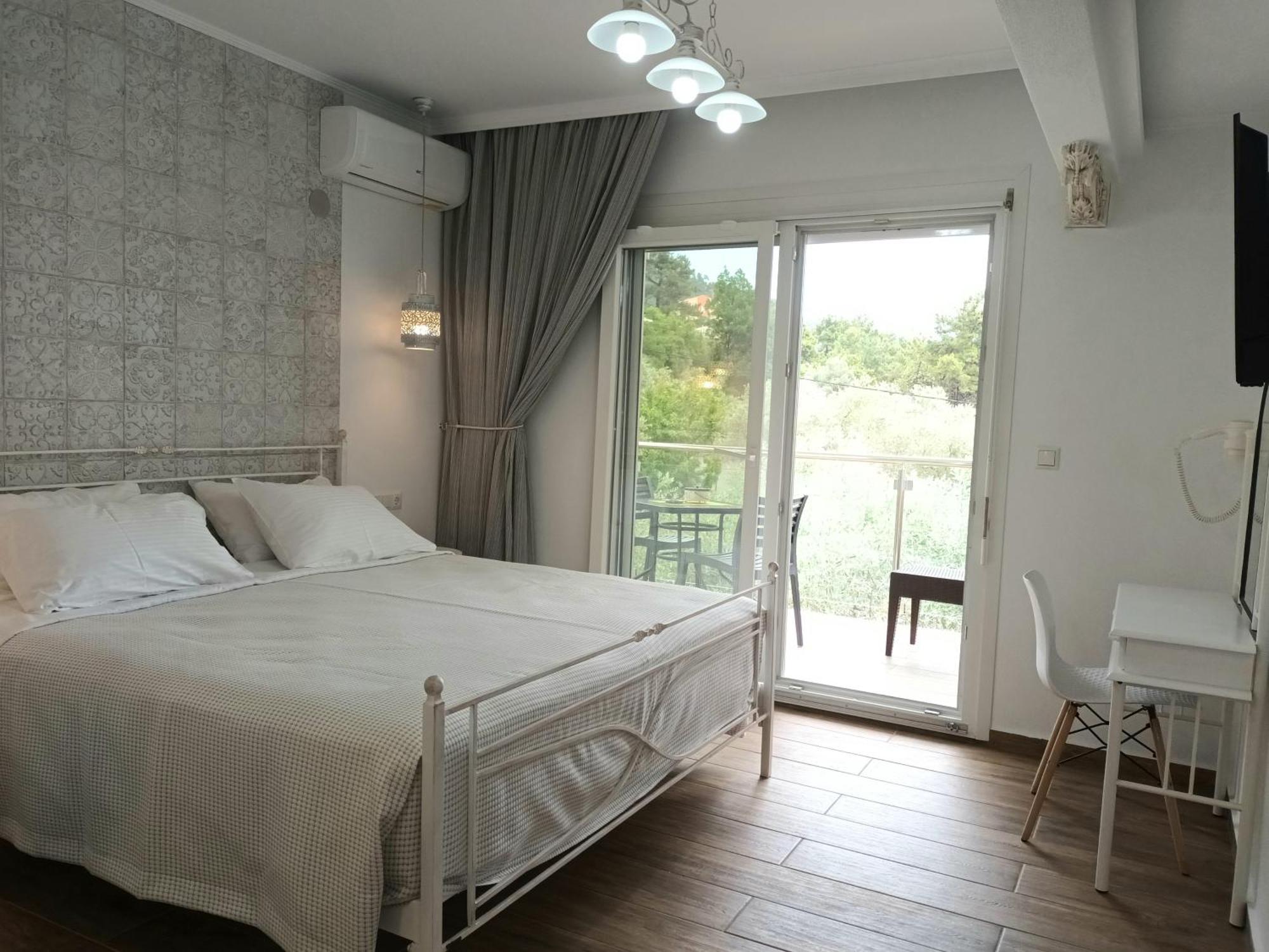 Olive Garden Villas Chrisi Ammoudia Rum bild